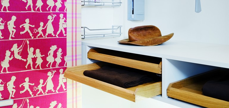All drawers, pigeon-holes and compartments are adapted to the family. 