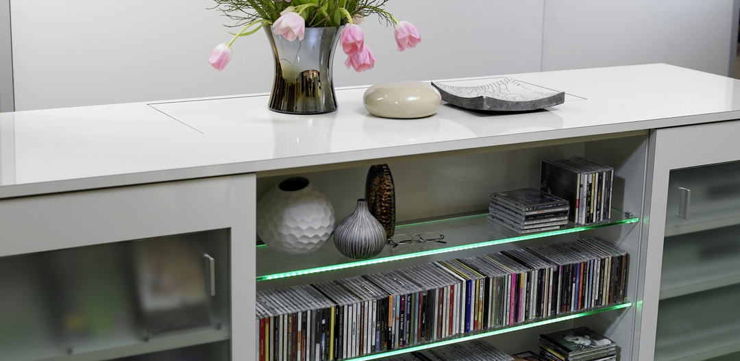 There is plenty of room on the left and right for storing CDs, DVDs or technical equipment.